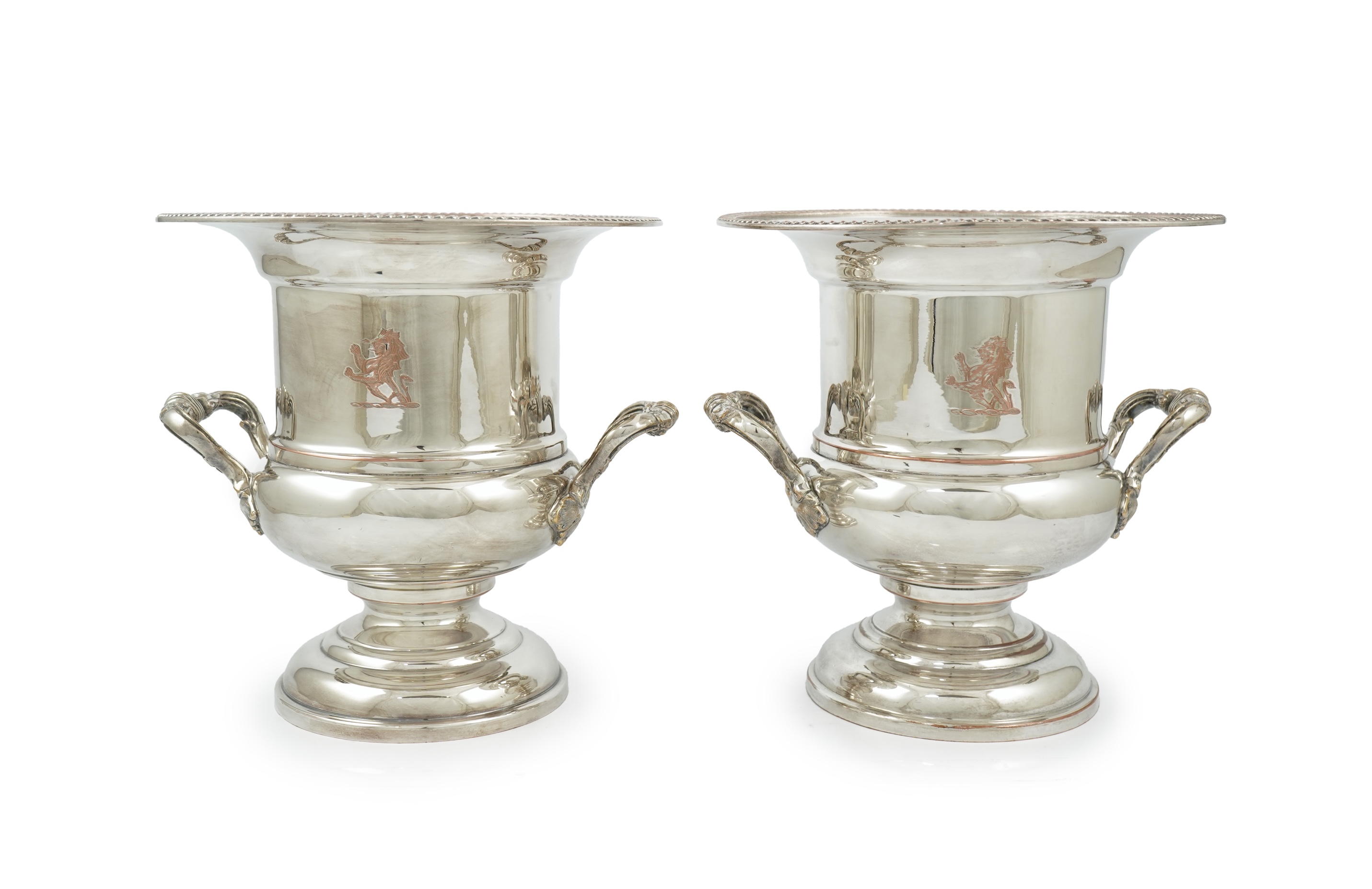 A pair of late 19th/early 20th century silver plated two handled campana shaped wine coolers, makers, FH